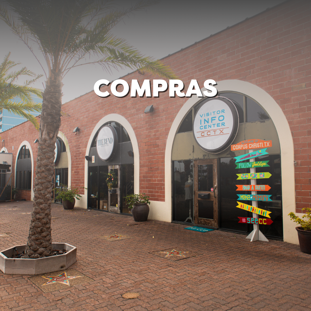Shopping plaza with visitor info center and colorful signage in Corpus Christi Texas