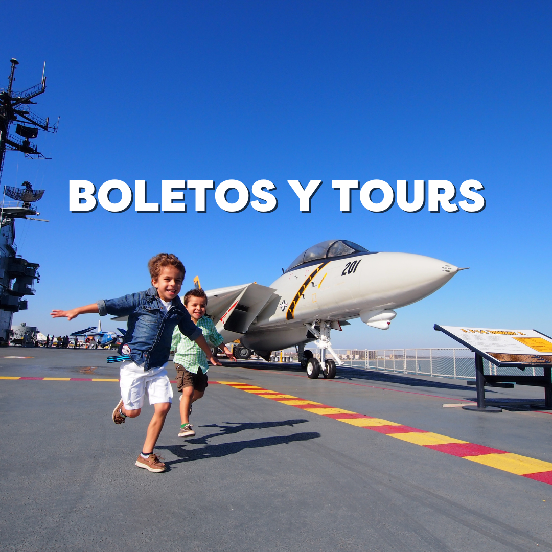 Tickets & Tours - Children running joyfully on an aircraft carrier deck with a fighter jet and blue sky in the background