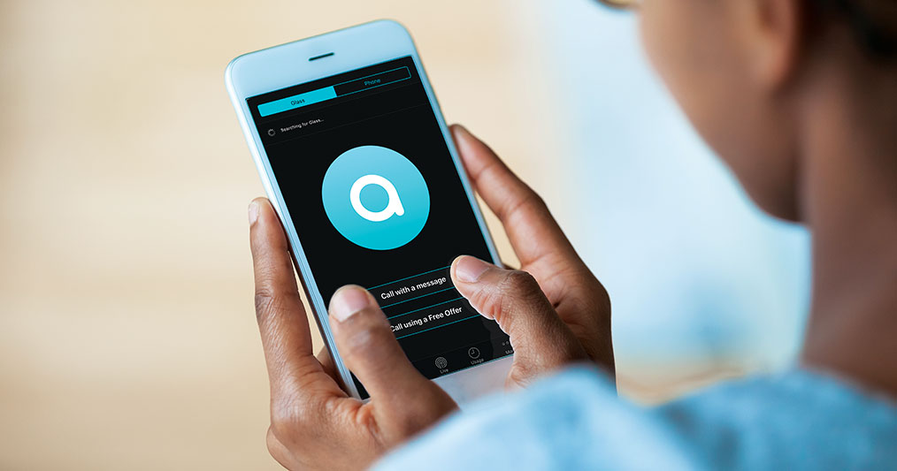 photo of someone holding a smart phone with the Aira app pulled up