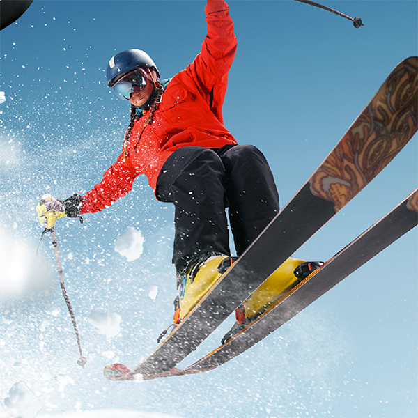 Snow skier jumping through air in Colorado